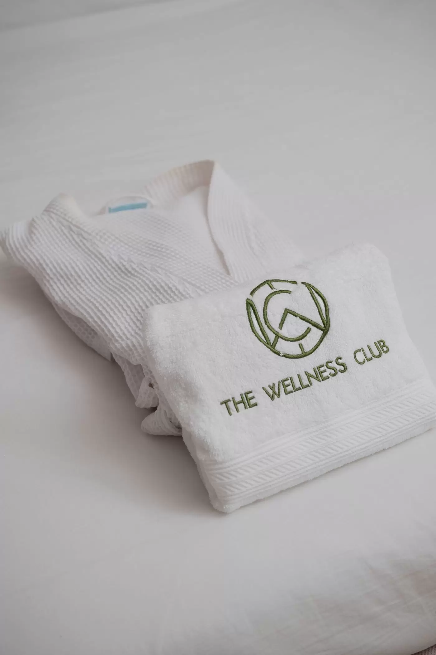 Spa robe and towel for massage guests